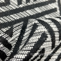 Tessuto jacquard geometrico bianco nero in maglia di viscosa/poliestere